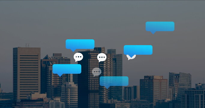 Floating digital chat bubbles hovering above downtown office towers, with messaging theme - Powered by Adobe