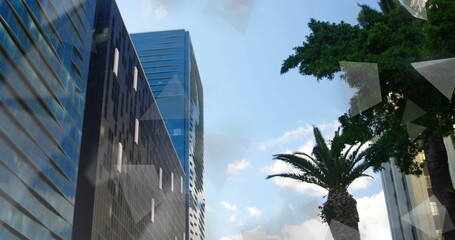Rising glass-clad skyscrapers in downtown, palm tree, leafy tree, clouds, reflections, copy space © vectorfusionart