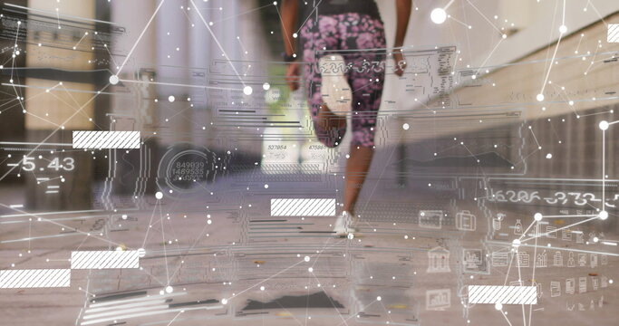 Running female athlete moving through covered corridor, with water bottle and digital data overlay