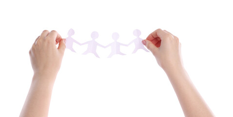 Woman holding paper figures of people on white background, closeup