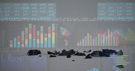 Displaying broken black fragments scattering on studio floor, with translucent charts and tables