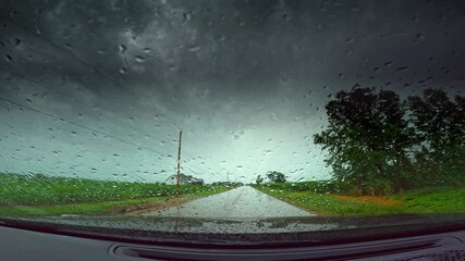 Driving into bad weather with and without windshield wipers.