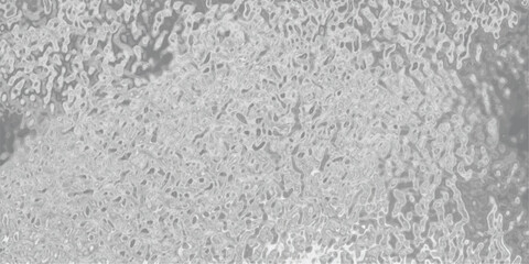 Abstract grayscale surface texture displaying organic patterns and irregular shapes suitable for backgrounds and design elements