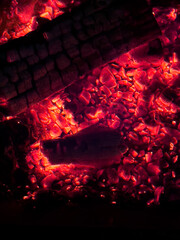burning coals in the fireplace