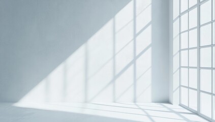 Obraz premium Empty room with large window, casting soft shadows