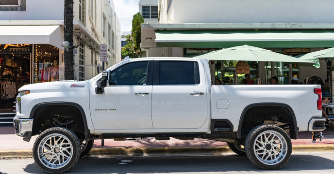 Miami, Florida, USA - April 21, 2025: Pickup truck Chevrolet Silverado. Car Chevrolet Silverado parked outdoor. White Chevy 2500HD, side view. 2020 Chevrolet Silverado 2500HD pickup truck car