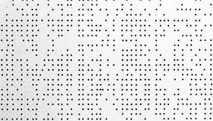 Grid of evenly spaced small black dots on white background