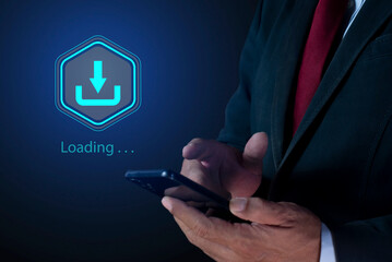Businessman use smartphone with download technology for data storage and transfer on virtual screen. symbolizing digital data storage, cloud services, technology for transferring files and media.
