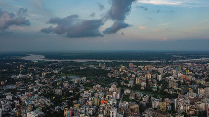 Aerial view of a densely populated city in Bangladesh, Asia. A city by the river.