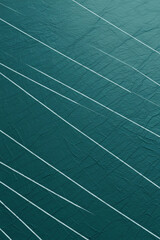 Abstract teal background with subtle white diagonal lines and texture