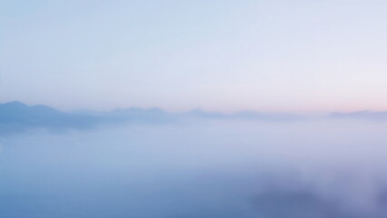 Fototapeta premium Rolling fog gradient with dreamy pastel tones in lavender and blue, elegant abstract desktop wallpaper or soft vertical mobile screen background 