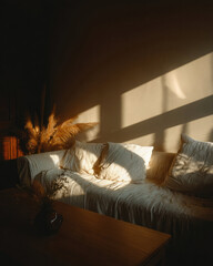 Cozy Living Room With Textured Sofa Bathed In Warm Sunlight And Soft Shadows In The Afternoon