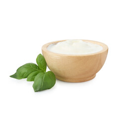 Tasty yoghurt in bowl and basil isolated on white