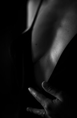 Sexy female cleavage in black and white