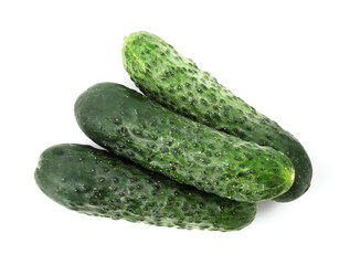 Three fresh green cucumbers isolated on white, top view
