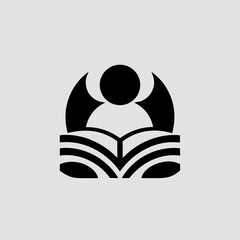 Fototapeta premium An open book is displayed with abstract shapes, representing the concept of reading and education