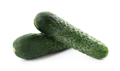 Two fresh green cucumbers isolated on white