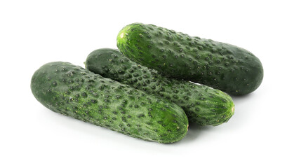 Three fresh green cucumbers isolated on white
