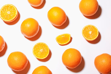 Fresh ripe oranges on white background, flat lay