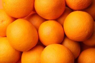 Fresh ripe oranges as background, top view