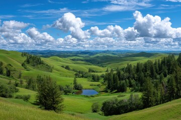 Naklejka premium Expansive verdant rolling hills under a vivid blue sky with fluffy cumulus clouds