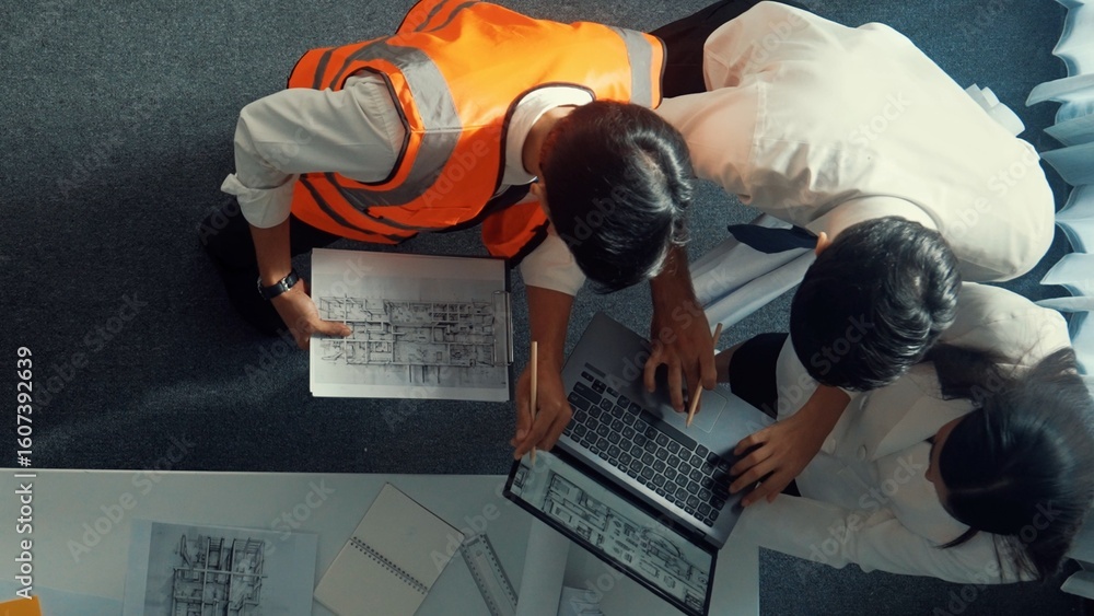 Poster top down view of project manager and civil engineer hold laptop while explain idea to architect. aer