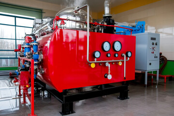 Large industrial boiler in operation at a manufacturing facility