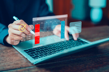 managing milestones on a timeline Gantt chart in technology online. concept of project planner in...