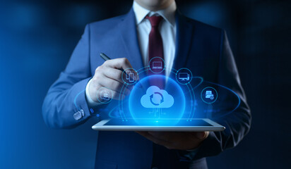Businessman Holding tablet with Cloud Computing Icons on Screen. Data transfer and Cloud Backup...