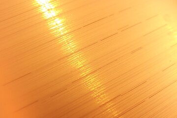 Close up of orange fiber optic strands with bright light