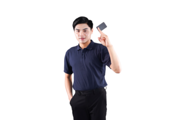 Payment Card Confidence: An individual, dressed in a navy shirt and black trousers, holds up a payment card with confidence, signifying financial empowerment and modern commerce.