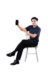 Mobile Technology: A man sits poised, gesturing towards a sleek smartphone, a modern portrait of...