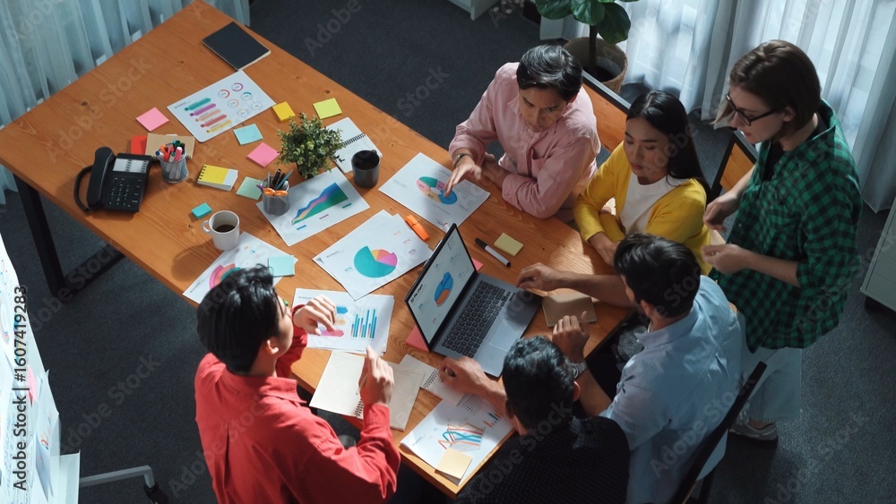 Poster group of skilled business people working together to analyze graph while project manager in casual c