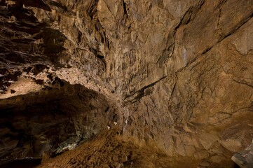 Karst formations inside Punkva Cave with illuminated stalactites and stalagmites, Moravian Karst,...