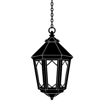 A vintage black lantern hanging from a chain, isolated on a white background
