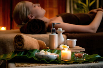 Aromatherapy massage ambiance or spa salon composition setup with focus decor candles and spa...