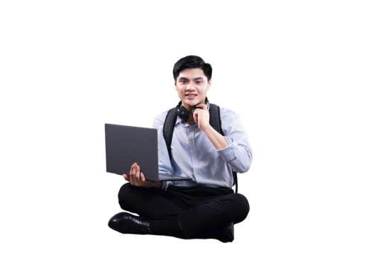 Tech Savvy Student: A young student, radiating confidence and poise, is seen engrossed in his laptop, Headphones slung casually around his neck, symbolizing modern learning. - Powered by Adobe