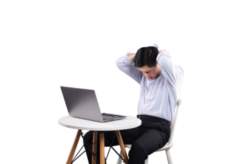 Frustrated Man and Laptop: A man, desk, chair, laptop. A moment of frustration. The person struggles to understand or get work done, and this demonstrates stress. 