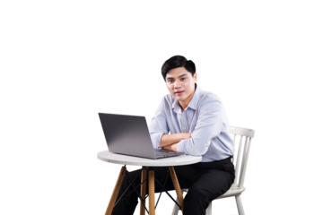 Focused professional working on laptop: A focused man sits attentively, using a laptop while sitting at a small round table. The scene evokes a sense of concentration and a modern workspace. 