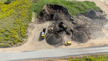 Aerial View of Construction Site with Heavy Machinery