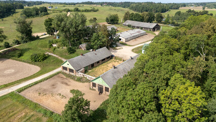 Aerial View of Rural Farm with Barns and Stables