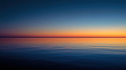 Calm water reflecting sunset hues