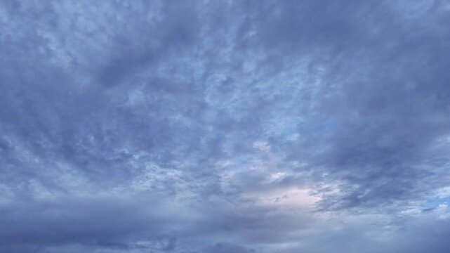 Drone hyperlapse of evening sky rainy clouds