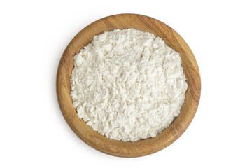 White flour in wooden bowl isolated on white background. Top view. Flat lay.