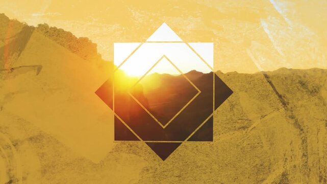 Sun peeking over peaks initiating gold diamond overlay rotating flooding valley to highlight warmth