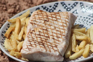 French tacos and french fries close up