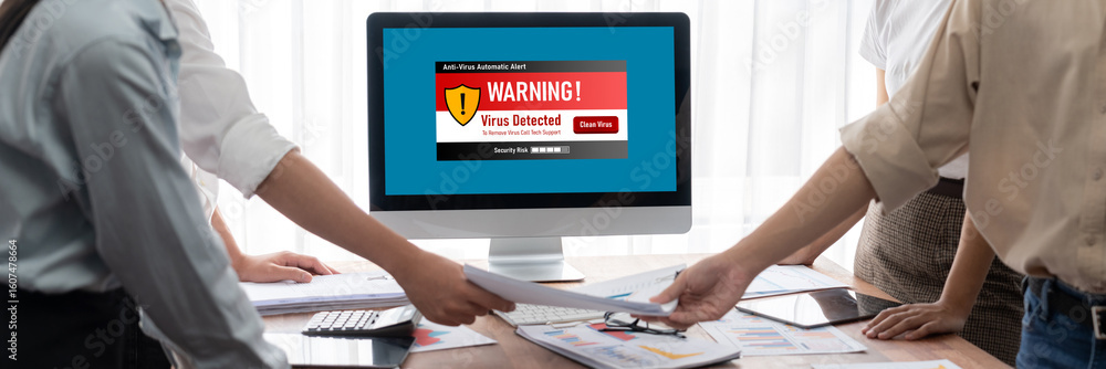 Poster virus warning alert on computer screen detected brisk cyber threat , hacker, computer virus and malw