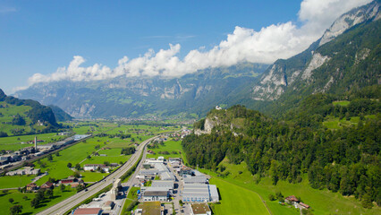 Aerial panorama view around the city Balzers in Liechtenstein on a sunny morning day in summer.