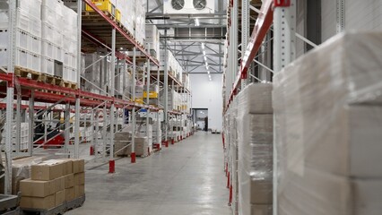 Goods stacked on industrial shelves in distribution warehouse
