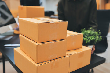 Portrait of Starting small businesses SME owners, two Asian woman check online orders Selling...